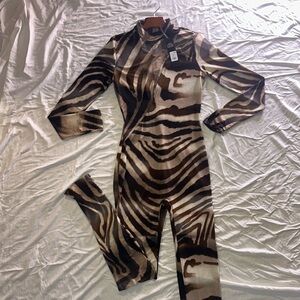 Fashion Nova
Let’s get Loud Jumpsuit